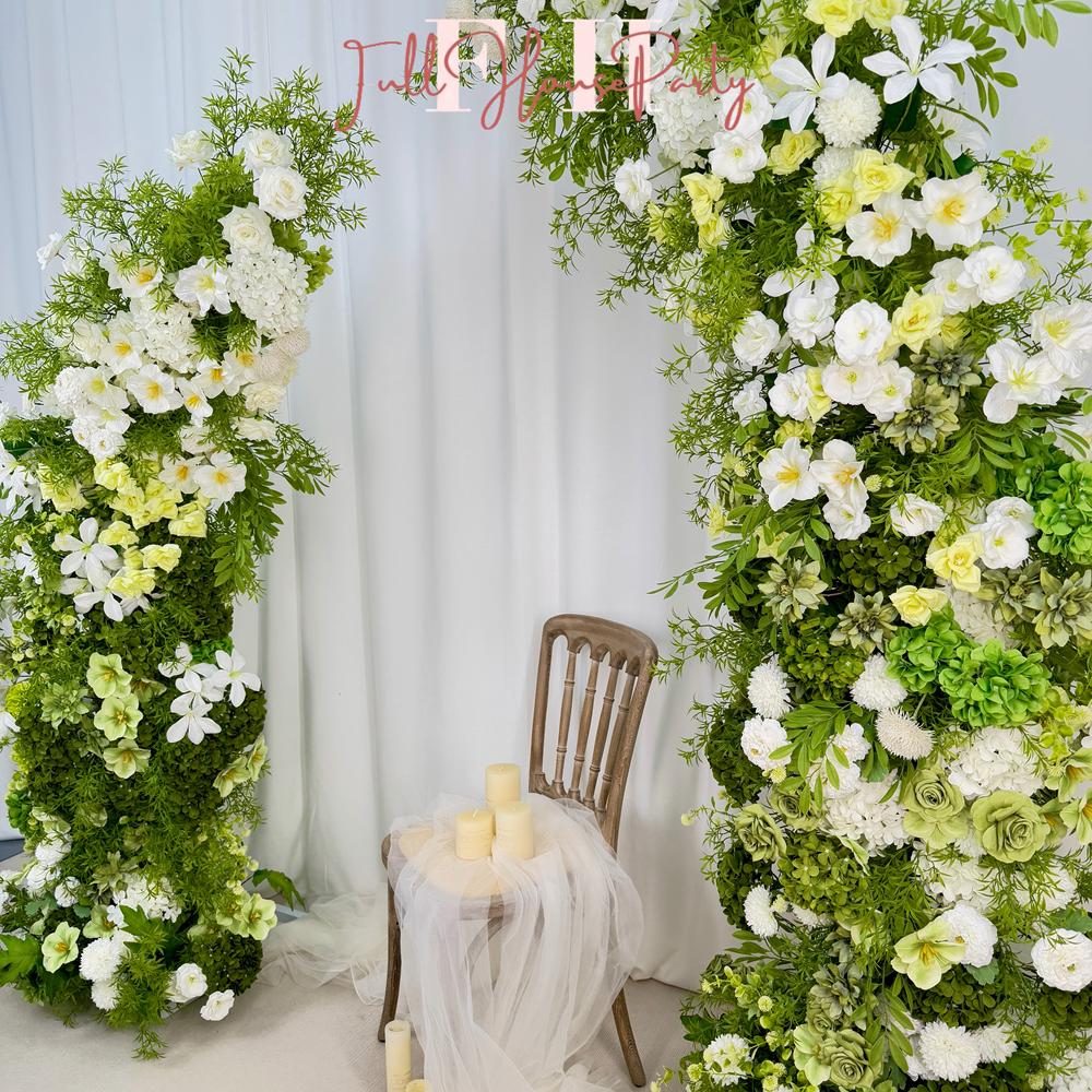 white floral and greenery wedding arch arrangement for ceremonies and events