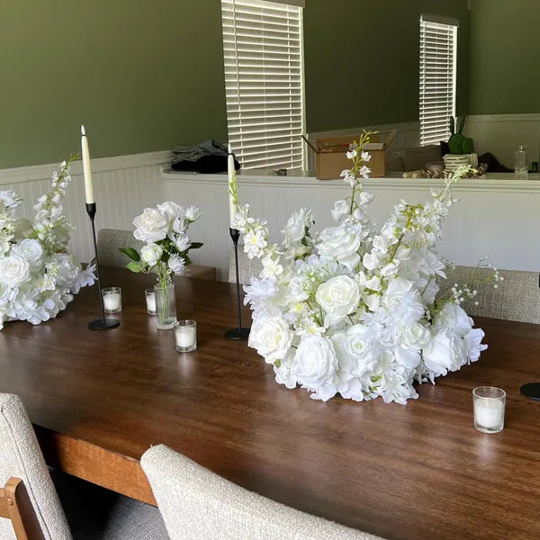 Customer photo of white floral table arrangements