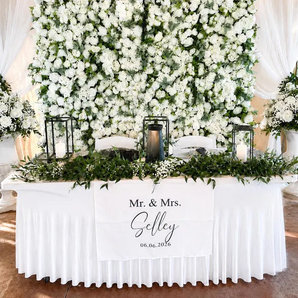 Customer photo of a white flower wall at an event